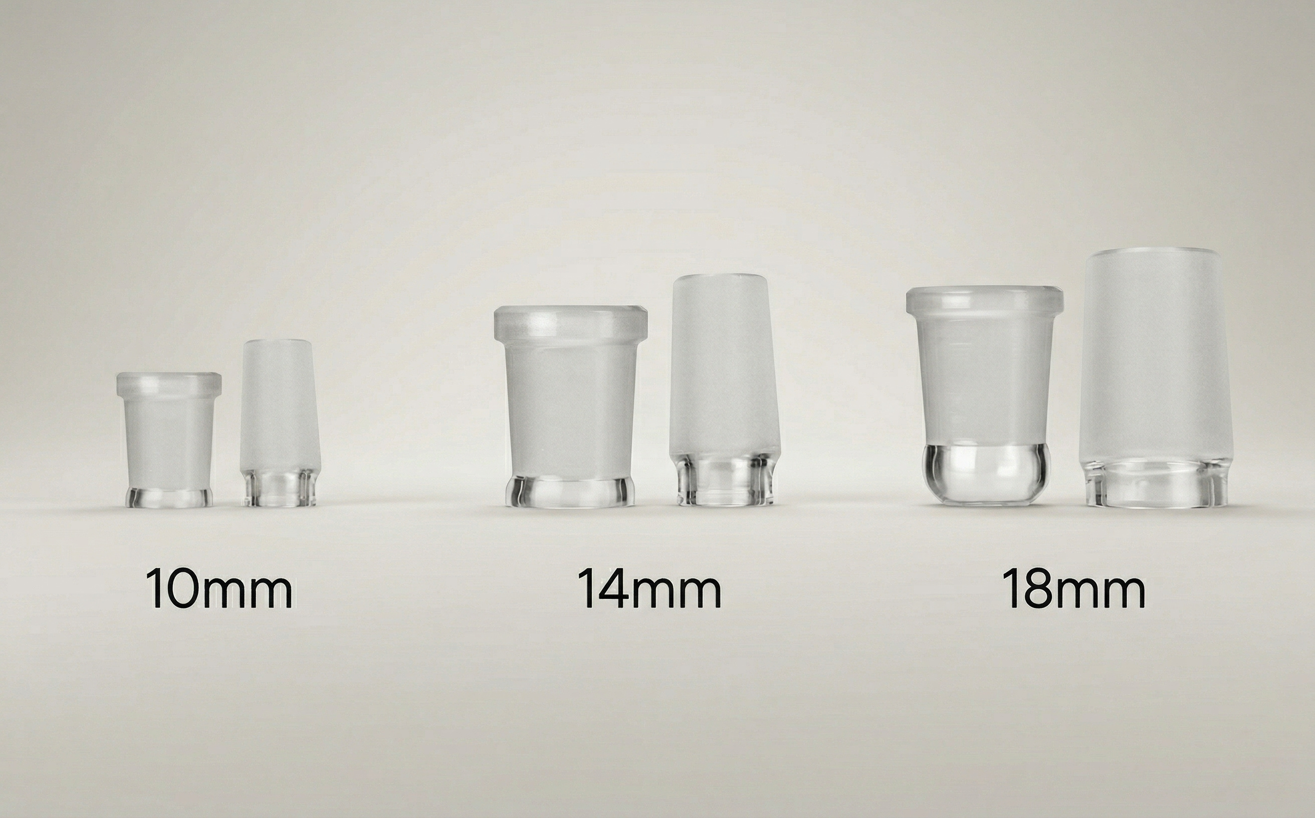 A side-by-side comparison of the three most common glass joint sizes used in dry vaporizer and water pipe setups: 10mm, 14mm, and 18mm. The image shows each size clearly labeled, making it easy to understand the relative scale difference at a glance.